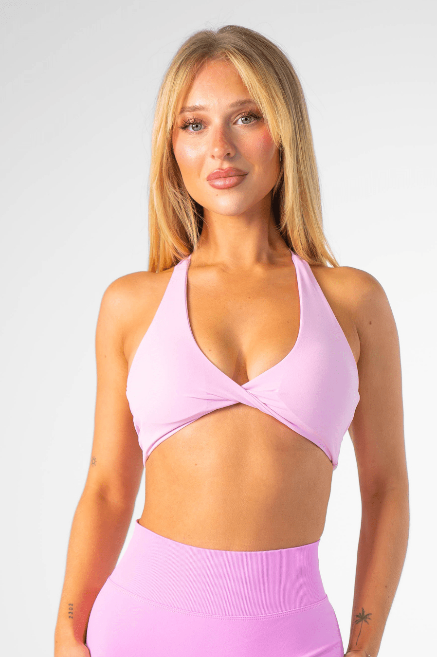 Elevate Your Style: Embrace History with Our Luxurious Front Twist Halter Bras - Club Athletica